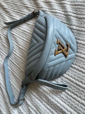 Authentic Louis Vuitton Light Blue Quilted Leather BumBag with Gold Hardware